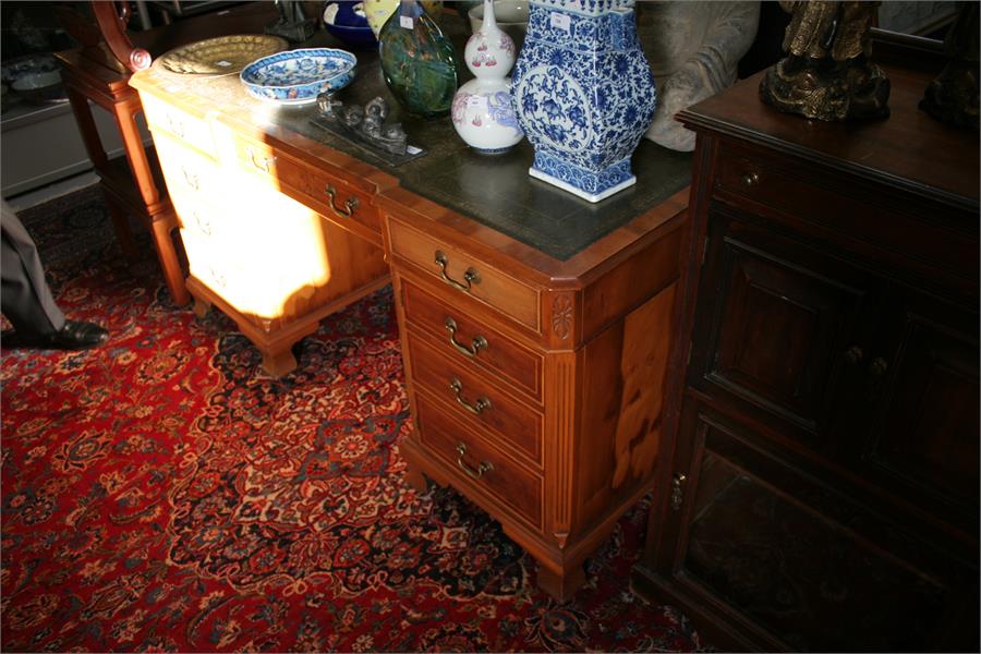 A reproduction yew wood pedestal partners desk, with green leather inset top above a combination - Image 9 of 10