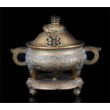 A late 19th / early 20th century Chinese bronze two-handled censer on stand, the pierced cover