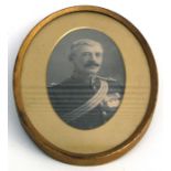 A gilt framed photograph of a Victorian Army Officer in uniform with his medals (possibly the
