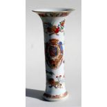 a 19th century Samson sleeve vase in the Chinese manner with armorial crest and foliate