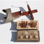 An Underwood & Underwood stereoscopic viewer and cards.