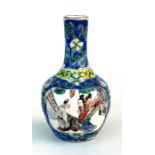 A 19th century Chinese Canton vase, decorated with figures on a pale blue ground, 13cm (5ins) high.