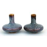 A pair of Chinese robin's Egg glaze squat bottle vases, 7.5cm (3ins) high. Condition Report good