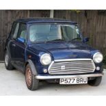 A 1997 Rover Mini 1.3i, registration P577 BRU, blue, one owner from new, 26182 mileage, fitted