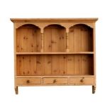 A modern pine wall mounted plate rack with open shelves and three short drawers 100cm (39.5ins)