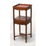 A Georgian mahogany two-tier night stand, the galleried rectangular top above a single drawer, on