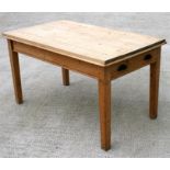 A stripped pine kitchen table with single drawer on square tapering legs, 140cm (55ins) wide.