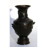 A Japanese bronze vase, decorated in relief with birds and prunus (later converted to a lamp),