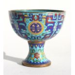A Chinese cloisonne stem cup with roundel and flower decoration on a turquoise ground, 7cm (2.75ins)