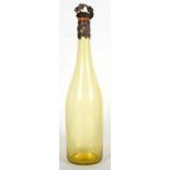A Victorian pale green glass wine bottle with silver mount and stopper, decorated grape and vine,