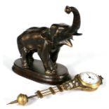 An elephant design mystery clock, the enamelled dial with Arabic numerals, in a brass case (lacks