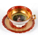 A Vienna porcelain cabinet cup and saucer, the decoration of a young woman. Condition Report Minor