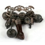 A Brazilian white metal (tests as silver) slave amulet 'Penca De Balangandans', the typical shaped
