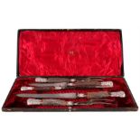 A Victorian cased ornate silver mounted stag antler five piece carving set. Sheffield 1896, makers