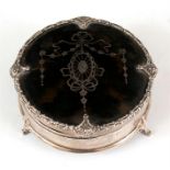 A silver and pique inlaid tortoiseshell trinket ring box on three legs, Birmingham 1910, Mappin &