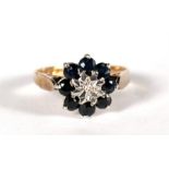 A 9ct gold diamond ans sapphire cluster ring. approx UK size M