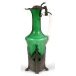 An Art Nouveau green glass & pewter carafe, 29cms (11.5ins) high. Condition Report The top join to