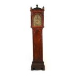 A 19th century figured walnut longcase clock, the arch shaped brass dial signed 'Moorland,