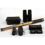 A Victorian brass three draw pocket telescope, a Russian monocular; a pair of cased lenses and a