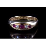 An 18ct gold ring set with two diamonds and three rubies. Chester 1919 Approx UK size 'O 1/2'