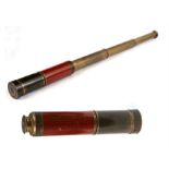 A Victorian mahogany and brass three draw telescope with brass lens cover cap. 24cm (9.5ins) long