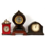 A mahogany cased mantle clock, the silvered dial with Arabic numerals; together with an oak cased