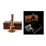 A mahogany cased students microscope, a Harrison's microscope, and another scientific instrument (