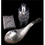 A Eastern silver scent bottle, together with similar vesta case and a tortoiseshell and silver