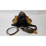 An early 20th century Royal Navy bicorn hat, with epaulettes and a belt in original metal case