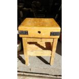 A 20th century hardwood and pine butchers block, 89cm high, 61cm square
