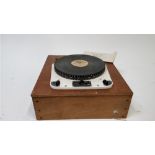 A Garrard transcription record player, model 30, on a wooden base, with the original instruction