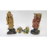 A Chinese hard stone figure of a scholar, along with a hard stone figure of a lady and two small
