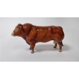 A Beswick model of a Limousin bull, 26cm long