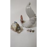 A Lladro model of chicken, along with a Lladro figure of a dancing girl and three thimbles