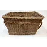 An early 20th century wicker laundry basket, applied label Chepstow St Mill supplied by Arthur