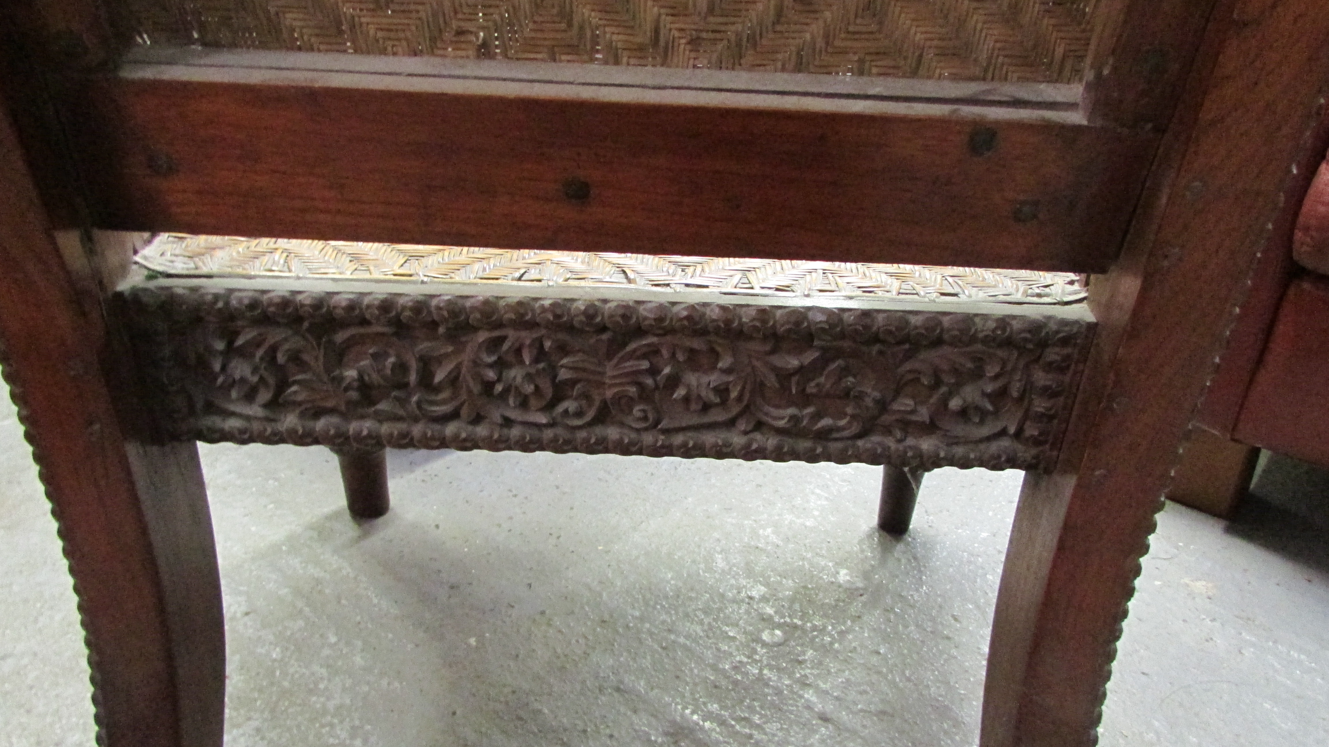 A 19th century Anglo Indian carved hardwood chair with a wicker seat and back - Image 7 of 7