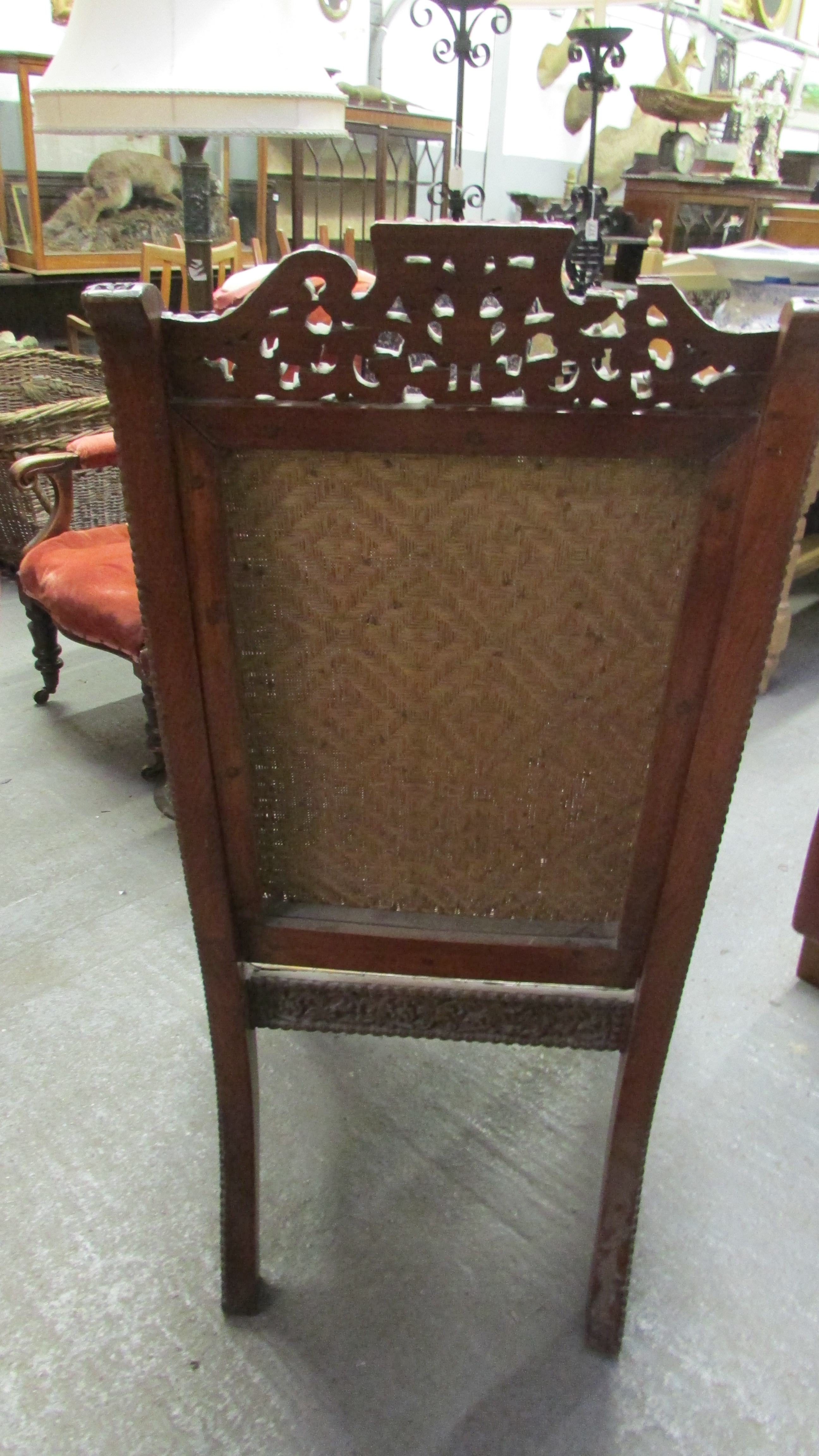 A 19th century Anglo Indian carved hardwood chair with a wicker seat and back - Image 4 of 7