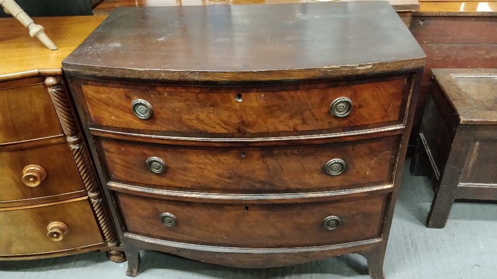 A Victorian mahogany bow front chest of drawers, of three long, on bracket feet with brass drop - Image 2 of 2