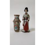 A Cantonese vase decorated with various figures, 18cm high, along with a ceramic model of geisha