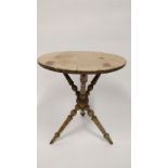 A Victorian pine cricket table, with a turned tripod base, 59cm high, 52cm diameter