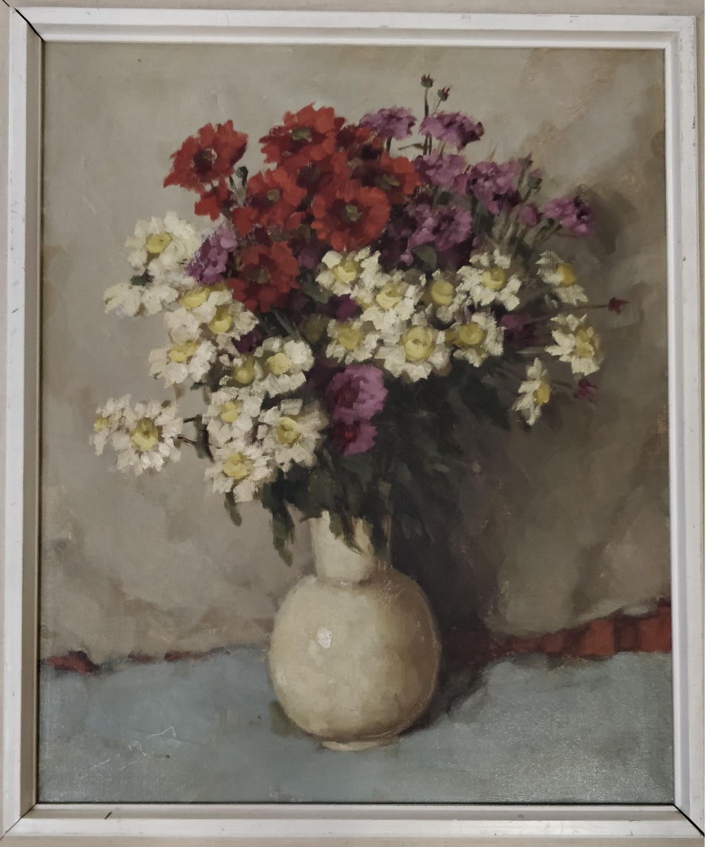 An oil on canvas of a still life, flowers in a vase, signed lower right C.M. Van Roy, 59cm x 49cm