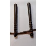 Two 20th century wooden truncheons, 139cm long