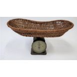 A set of Hughes's baby weighing scales, NO48B, with an original wicker basket