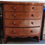 A Victorian bow front chest of drawers, with mother inlaid handles, of two short and three long,