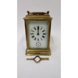 A 19th century carriage French carriage clock, with a white enamel dial and Roman numerals