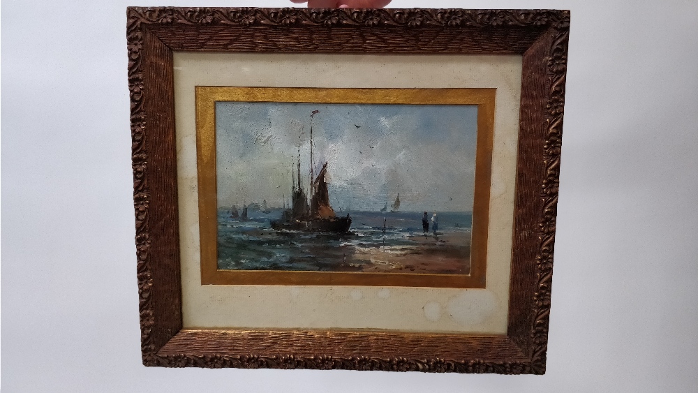 An oil on panel of boats at the seaside