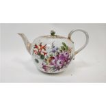 A Meissen bullet shaped teapot, decorated with sprays of flowers on a white ground, 23cm long