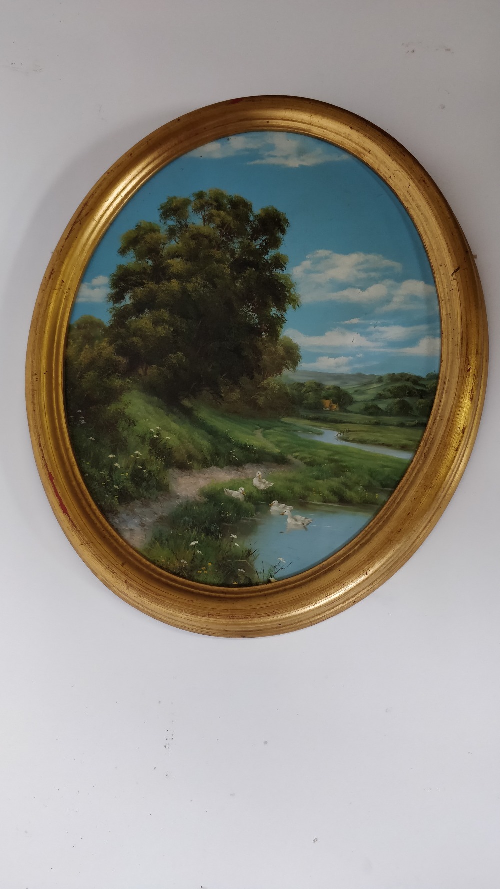 A 20th century oval oil on panel of a country scene by Lesley Hammett, 34cm x 26cm