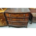 A Victorian mahogany bow front chest of drawers, of three long, on bracket feet with brass drop