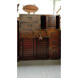 A modern Korean storage unit, set with various drawers and cupboard sections, 97cm high, 88cm